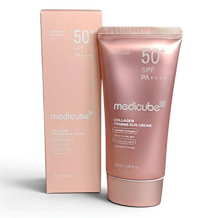 Ujędrniający krem przeciwsłoneczny Medicube Collagen Firming Sun Cream SPF50+ PA++++ 50ml w różowej tubce obok kartonowego opakowania.